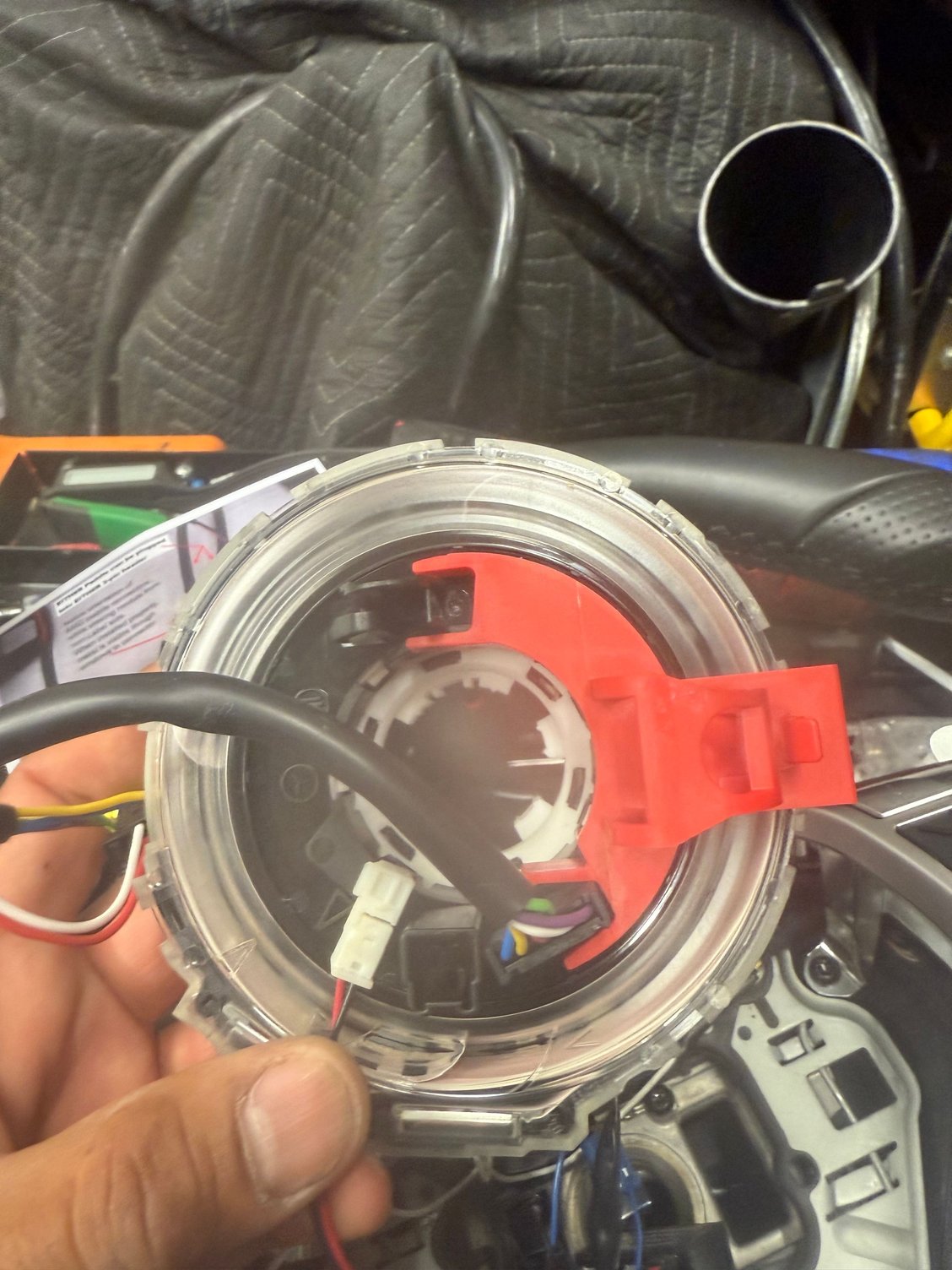 The white plug is different from the female connector on the clockspring. I did also purchase an updated steering column piece that houses the clockspring. 