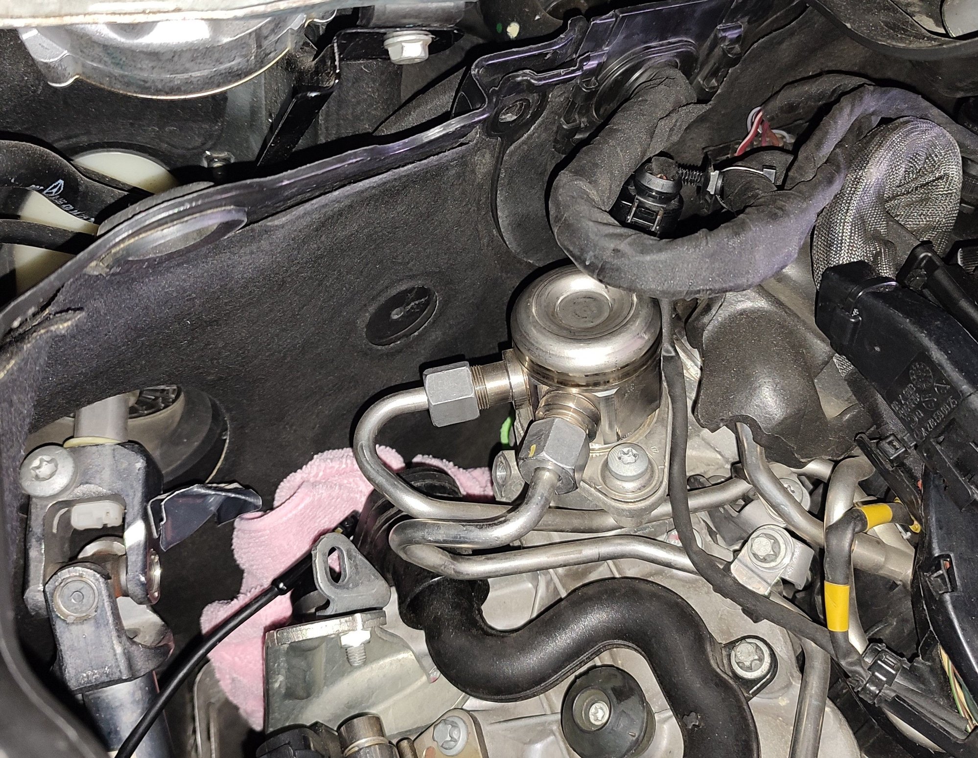 Crash plate and insulation gone, now to remove the vent valve bolts and detach the vacuum line