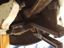 Use a ball joint separator instead of a pickle fork. Also probably better to take off the tire and check your other joints to see what else may need to be changed.