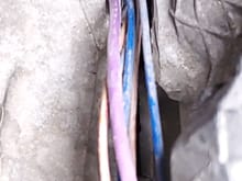 Wires from starter with flexible sleeve removed