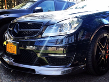 Revozport Front Lip and Grill with AMG grill emblem. Carbon Fiber tire pressure caps too but not noticeable.