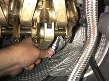 Inserting new Bosch spark plug with some dielectric grease on threads (Make sure that electrode is clean)