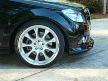 Close up of C350 with Carlsson Front Lip Spoiler, Carlsson Stainless Steel Grills, and 19&quot; BRABUS Monoblock E wheels