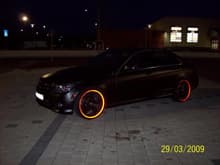 night shot (reflective tape outlining the wheels)