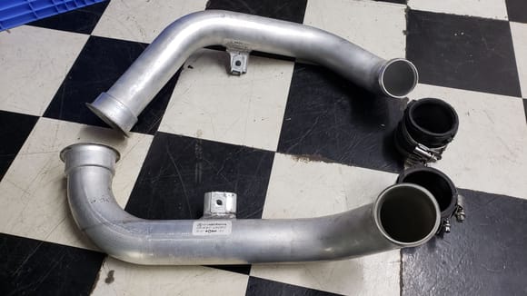 Factory charge pipes, and they are actually good to go as most turbo systems use rubber flex pipes. Just get them sealed up. Once again, no way that "fork" clamp and the O-rings are holding over 20psi. 