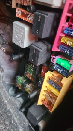 You can probably tell from the fuse colors which ones i changed lol each one that doesnt have a clear glass looking color. I changed that bright green and the bright yellow down the row. One in the purple plastic fuse section and the other in the yellow plastic fuse section. 