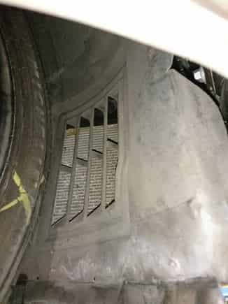 Stones are projected through the air vent in the inner wheel arch guards into the rear of the heat exchangers