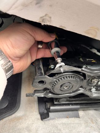 If yours isn’t broken like mine was, you’ll have to remove this second screw which holds the trim piece to the seat frame. So in summary, there are two 8mm screws holding the air bag to the seat frame, and 2 t25 screws holding the trim piece to the same seat frame. 