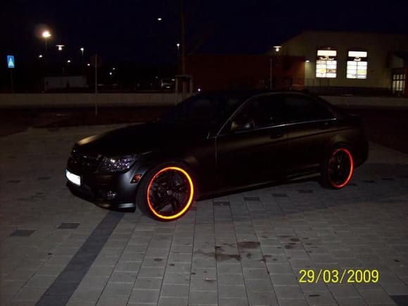 night shot (reflective tape outlining the wheels)