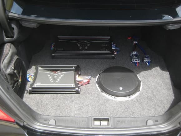 In the trunk, 2 Kicker Amps and a 12&quot; JL W6v2 sub