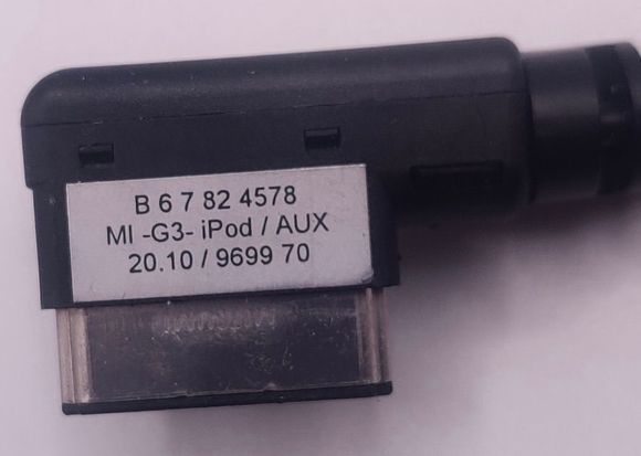 Plugs into port in the roof of the pass side glovebox.