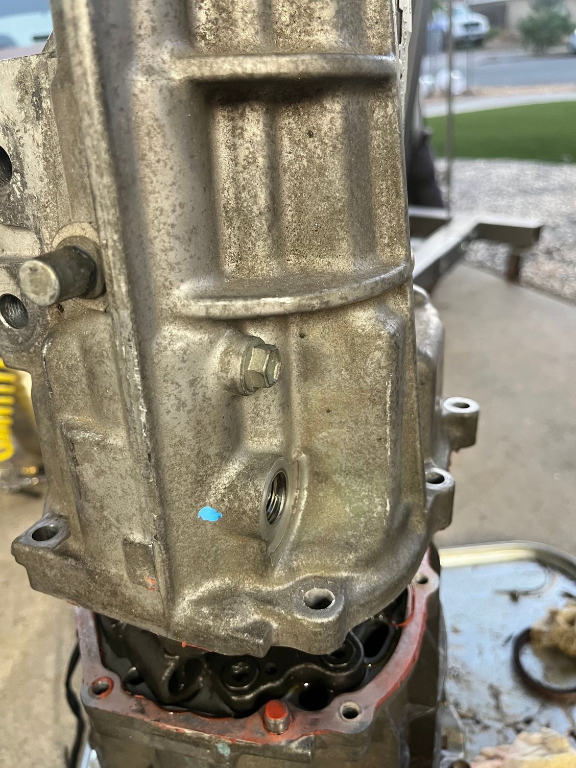 Remove this M8 bolt to the rear of that sensor you removed, before you attempt to separate the case.