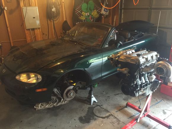 Next to the rusted dented beat up turd it's going into