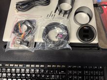 Here the unit shown with the contents of it items from the Glowshift gauge kit. The wire harnesses for the temp and pressure gauges ended up being short, so I extended them 4’ (5 wires total)
