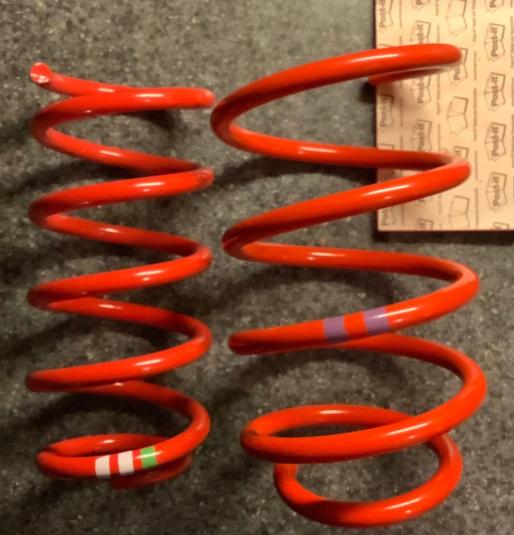 JCW Sport suspension with coil springs in Red