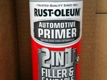 I've used Rustoleum aerosol paint products in the past but never their "sandable" primer. 
Reluctantly at first; using anything with the word "Oleum" as an active component often makes extremely dubious. 