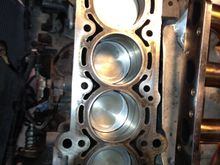 Piston positions 2ea center low, 2ea ends high.
Timing chain held in place during maintenance.