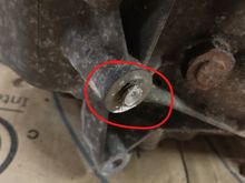 Seized motor mount bolt that broke when try to remove. Has been soaked in Kroil, so you might be able to removed now. 