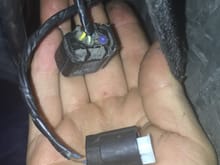 I know the wire below goes to the trim lights, but the bigger connector, I have no clue