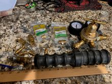 I bought a cheap regulator for this that can support 400 PSI; next is to assemble the hose with the right fitting with a valve to control the quick release dildo  which attaches to the car