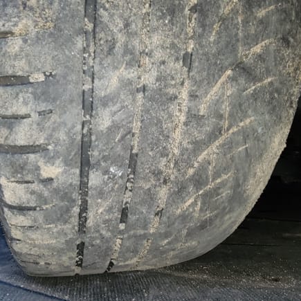 Front tires as they sit at the moment. Dang, so bald, and oh so uneven tread wear. Since buying the car I've had front tire wear issues. Yet their camber is no where near as visible as the rear tires.