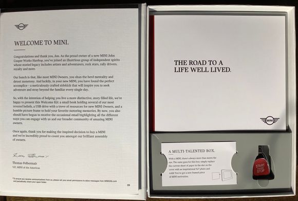 A letter from the Pres of MINI USA, a little book of MINI excitement and a USB drive in the shape of the MINI’s starter button.  I wonder if there is anything preload on it?