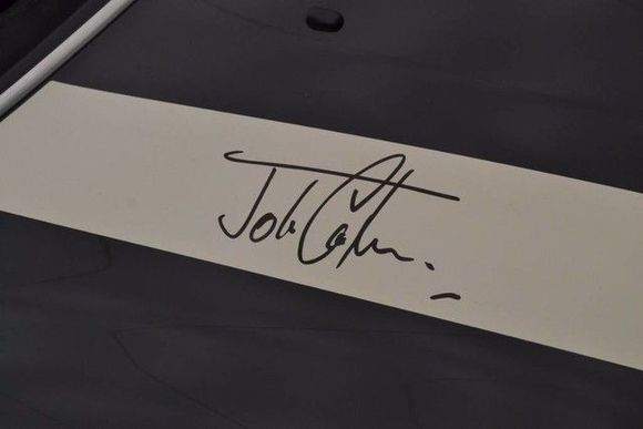 Signed by John Michael Cooper 