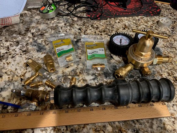 I bought a cheap regulator for this that can support 400 PSI; next is to assemble the hose with the right fitting with a valve to control the quick release dildo  which attaches to the car