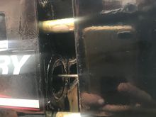 Tried to pull the gearbox off and I am stuck.

I can’t see a clip to disconnect the gear shift cable.

Maybe it is the reason I am stuck in reverse. 
