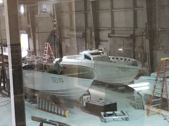 I was at the factory three weeks ago. Mine is the one in the back. I believe actual production started in Mid-may. 
As of this week I have not heard that it has progressed to the rigging shop. 

They had about seven 340’s in some stage of rigging in the separate building. 
I want to compliment everyone at the factory though. They took a ton of time with us even though I’d already picked build options back in December. 
First time my wife has been there or even seen on before. I appreciated 