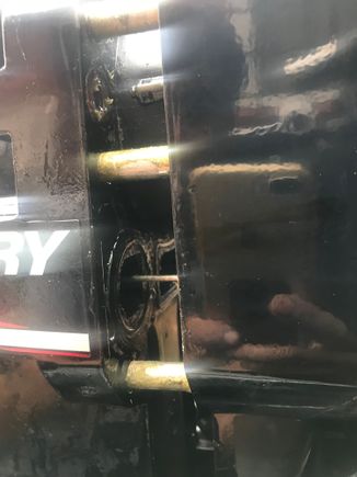 Tried to pull the gearbox off and I am stuck.

I can’t see a clip to disconnect the gear shift cable.

Maybe it is the reason I am stuck in reverse. 