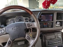 Interior installed in the truck. I used the Denali door panels, window switches, dash board, stereo bezel, gauge cluster, center console, leather seats, power folding mirrors with turn signals, and all the interior plastics. Even the double din stereo was pulled from the donor.(Thats an Escalade steering wheel with original chevy airbag)