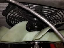16" Flexalite 3,000 cfm puller installed behind the radiator with custom mounting brackets.