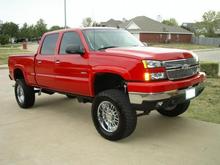 Painted Flares,Escalade handles, 35"Grapplers on 20" KMC Backseats.
