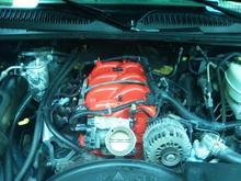 Chevy Orange Stock Intake, I bet a Raylar intake would look pretty nice in there too... Before the CAI Kit was installed