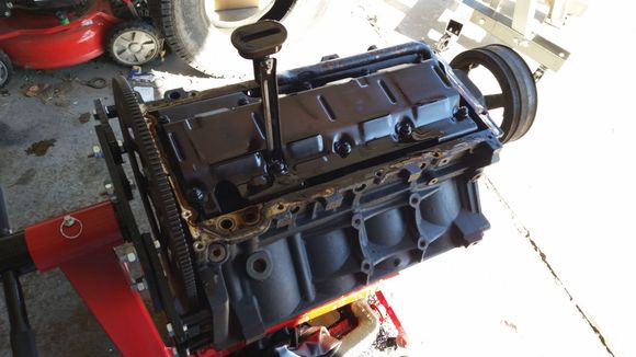 Pan off, there was only 1 bolt holding the oil pickup tube to the mounting surface,  is this normal?