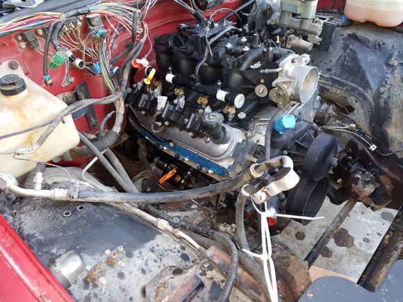 This is all the way forward on the dirty dingo mounts. Put the tranny right back in the same location but i might unbolt it tomorrow and slide it back further,  ive only got 1 3/4 inch yoke engagement.  My buddy pulled it so i dont know if thats how it was but makes me nervous.

Id like at least 2.5 inches of engagement on the driveshaft yoke.