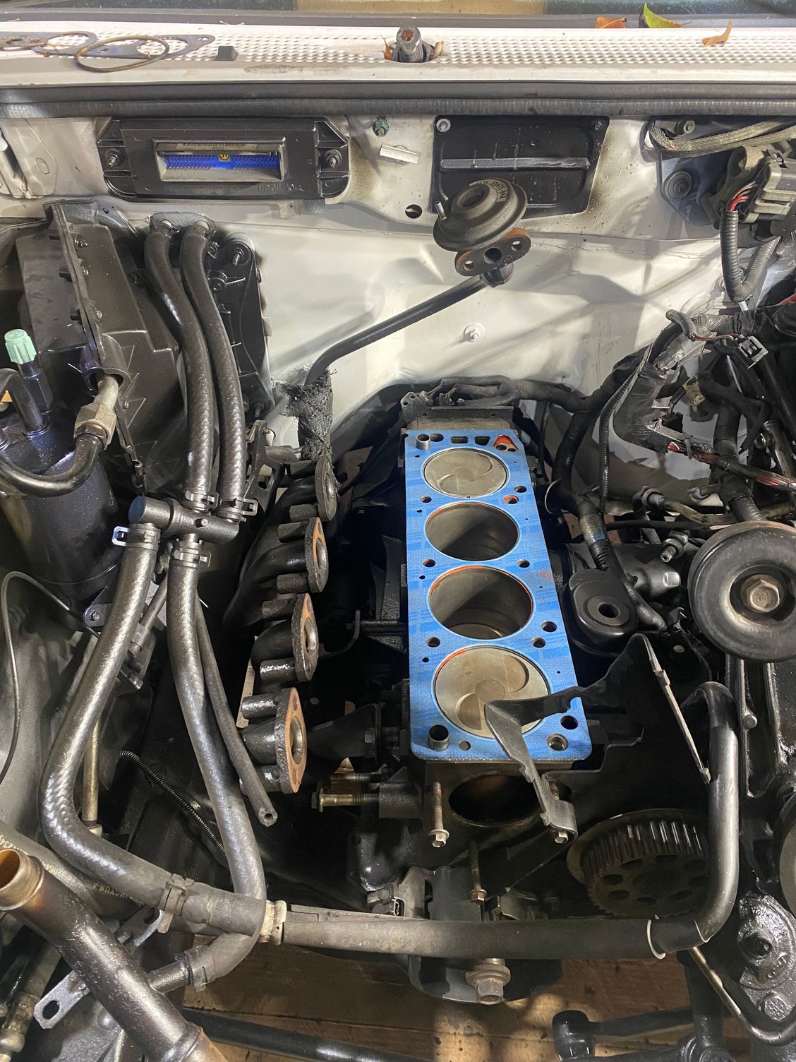 Cleans and places gasket next day head arrives 