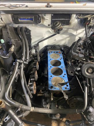 Cleans and places gasket next day head arrives 