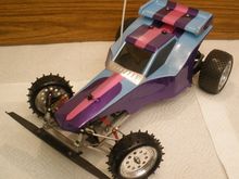 AYK Buffalo that I resto-modded for a buddy's girlfriend, hence the color choices of the freshly painted body.

The biggest challenge was to modernize the rear end to mount modern 2.2" wheels; 12mm hexes with cross-pins, axles &amp; bearings as well as modification of the insides of the swing-arms was required. Replaced the crappy front mono-shock with a Kyosho Gold, beefed up the steering linkages with 4.8mm balls &amp; cups and added some alloy wheels. Powered by an old Tekin ESC and Kyosho Le Mans 360 Gold motor.

More detailed info here: 

http://www.rc10talk.com/viewtopic.php?f=33&amp;t=24843