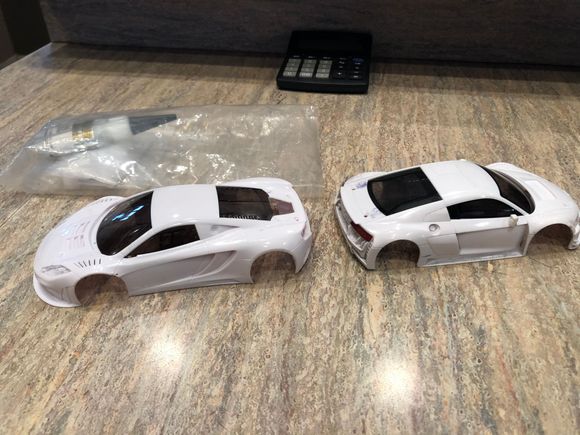 Both need rear wings. What the options. I tried the Jomurema wing on the Audi. But need to drill holes. Not sure if I trust my aim. 