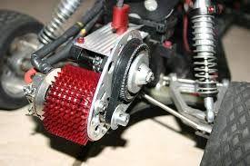 Motor to topshaft connection handled by a belt