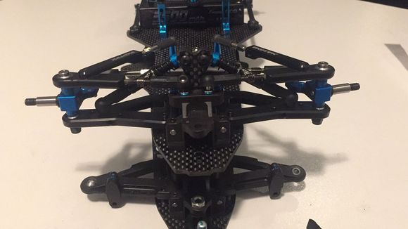 Look at the front end difference between the top (new v2 arms) and the older set!