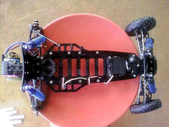 Carbon upper, lower and uprights. Only thing missing is battery holder and rear wing/assembly.