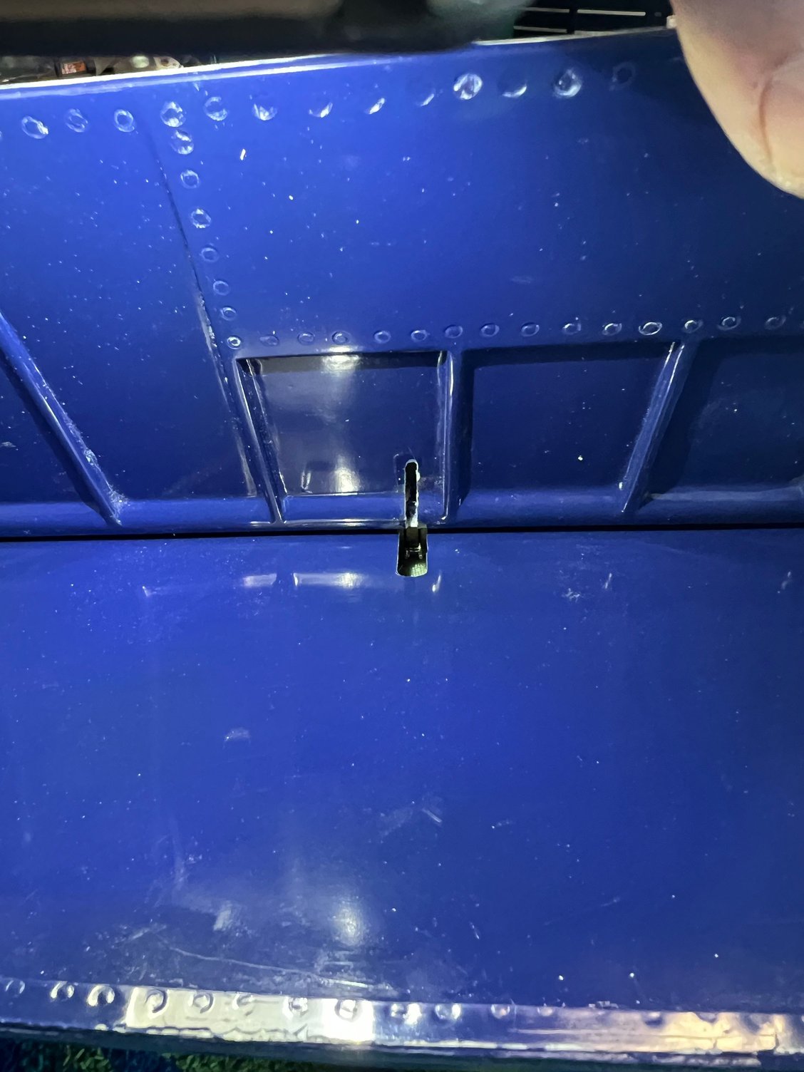 Slot the flap and use slot to locate control opening.