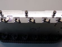 The sides have CNC machined detail.  Includes adjustable idler/tensioner.