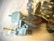 Metal idlers adjuster. They look like MATO one that have been modified to work with a larger idler wheel. 