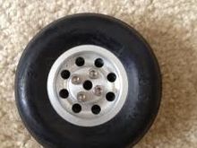 All metal hubs that bolt together with low bounce tires that are 4 1/2" NIB!