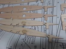 Original servo extension routing holes were glued back and eliminated and re routed in a different location