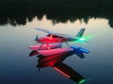 Flying my float plane at the local lake.   To make it stand out at dusk, i added some lights. 